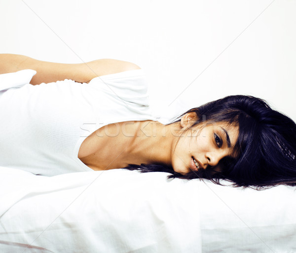 pretty mulatto brunette woman in bed, cant sleep Stock photo © iordani
