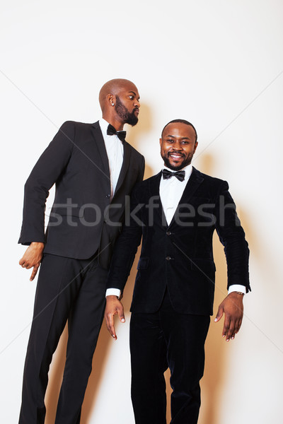Kettő üzletemberek fekete öltönyök érzelmes pózol Stock fotó © iordani