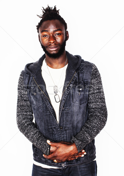 young handsome african american boy smiling emotional isolated on white background, in motion gestur Stock photo © iordani