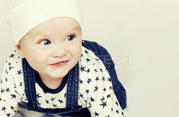 Küçük sevimli bebek halı yalıtılmış Stok fotoğraf © iordani