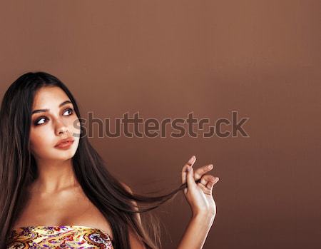 cute happy young indian woman in studio close up smiling, fashion mulatto Stock photo © iordani