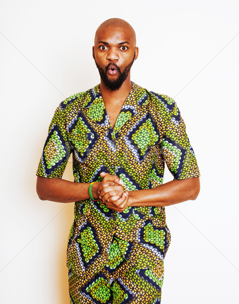 portrait of young handsome african man wearing bright green nati Stock photo © iordani