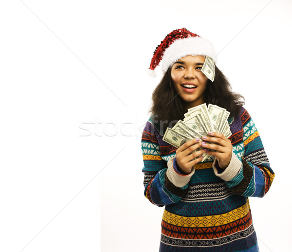 cute young girl in santas red hat with money isolated Stock photo © iordani