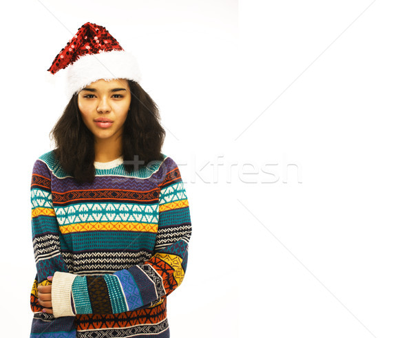 cute young girl in santas red hat isolated Stock photo © iordani