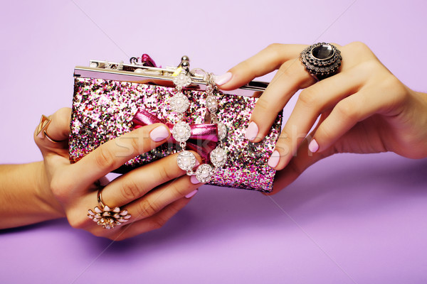 little girl stuff for princess, woman hands holding small cute handbag with jewelry and manicure, lu Stock photo © iordani