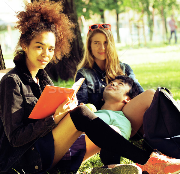 cute group of teenages at the building of university with books  Stock photo © iordani