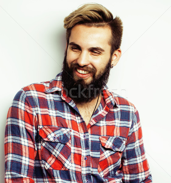 young handsome hipster bearded guy looking brutal isolated on white background, lifestyle people con Stock photo © iordani