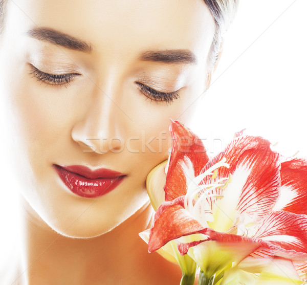 young pretty brunette woman with red flower amaryllis close up i Stock photo © iordani