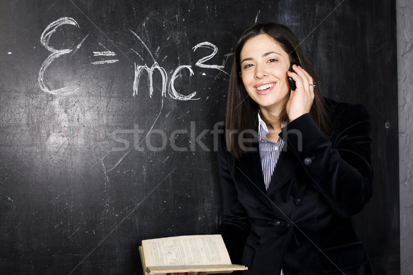 portrait of happy cute student in classroom at blackboard back t Stock photo © iordani