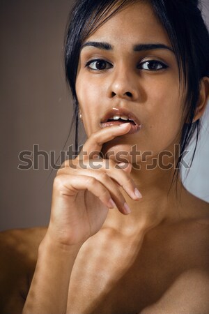 young pretty african american woman naked taking care of her skin isolated on white background, heal Stock photo © iordani