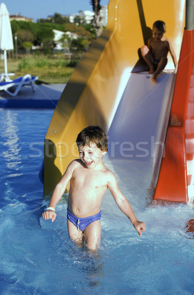 little cute real boy in swimming pool close up smiling, lifestyle vacation people concept Stock photo © iordani