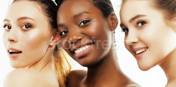 three different nation woman: african-american, caucasian together isolated on white background happ Stock photo © iordani