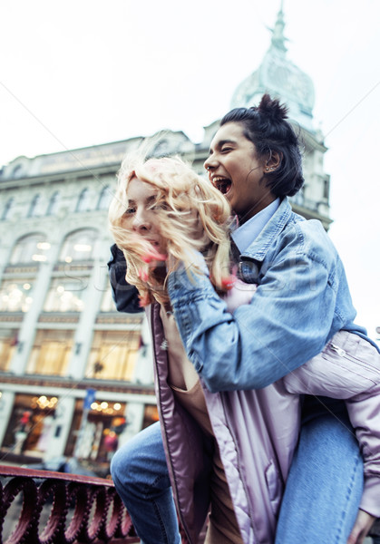 cute young couple of teenagers girlfriends having fun, traveling Stock photo © iordani