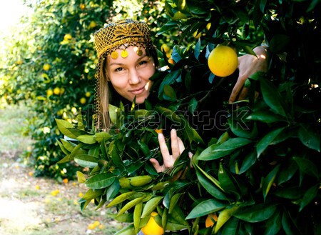 Bastante Islam mujer naranja arboleda sonriendo Foto stock © iordani