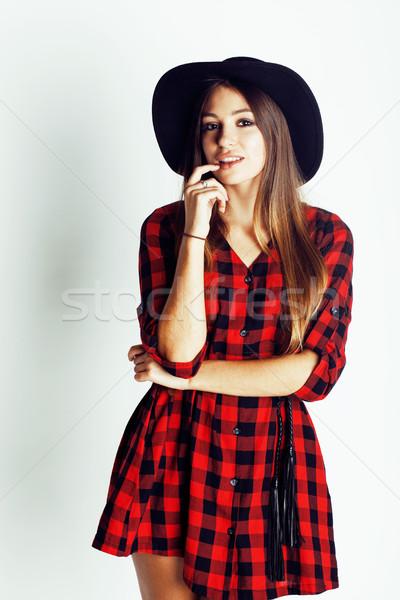 young pretty brunette girl hipster in hat on white background casual close up dreaming smiling. real Stock photo © iordani