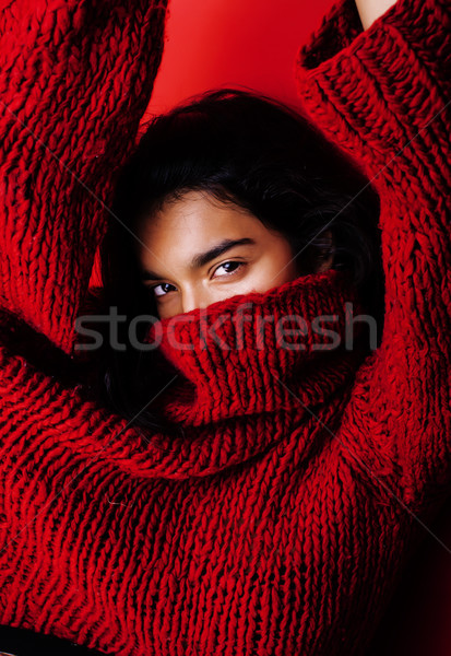 young pretty indian mulatto girl in red sweater posing emotional, fashion hipster teenage, lifestyle Stock photo © iordani