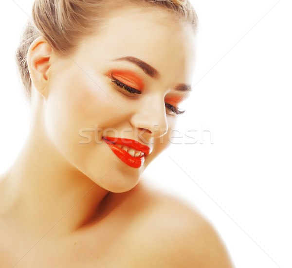 young blond woman with bright make up smiling pointing gesturing Stock photo © iordani