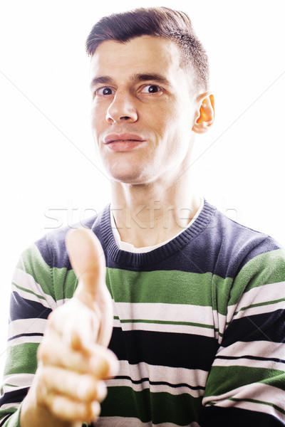 Portrait of a smart serious young man standing against white bac Stock photo © iordani