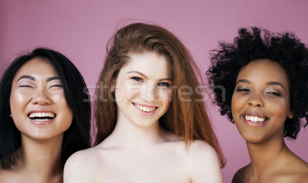 three different nation girls with diversuty in skin, hair. Asian, scandinavian, african american che Stock photo © iordani