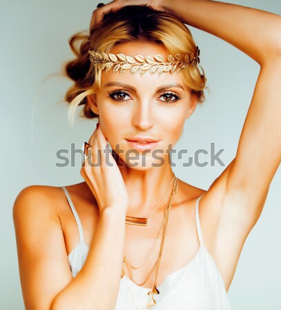 young blond woman dressed like ancient greek godess, gold jewelry close up isolated, beautiful girl  Stock photo © iordani