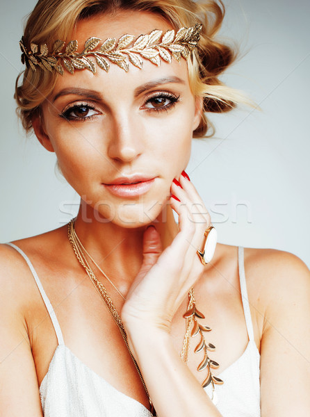 Stock photo: young blond woman dressed like ancient greek godess, gold jewelr