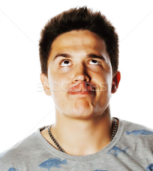 young attractive real man isolated thinking emotional on white close up gesturing smiling Stock photo © iordani