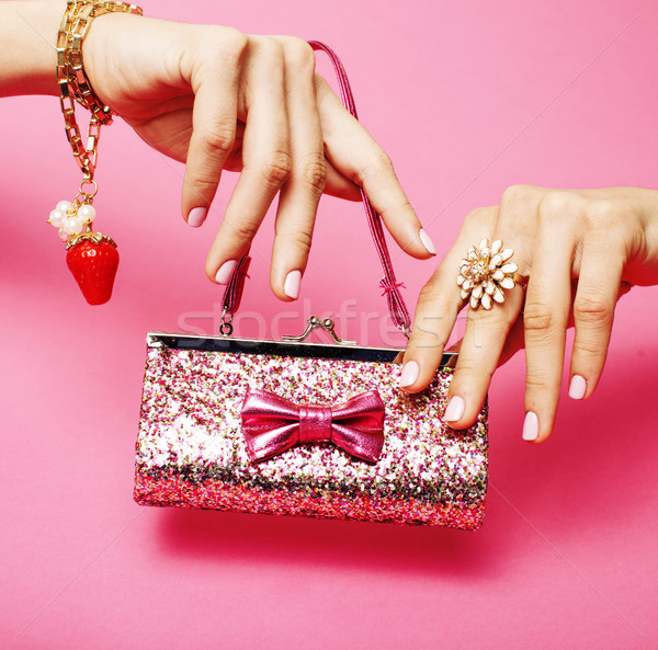 little girl stuff for princess, woman hands holding small cute handbag with jewelry and manicure, lu Stock photo © iordani