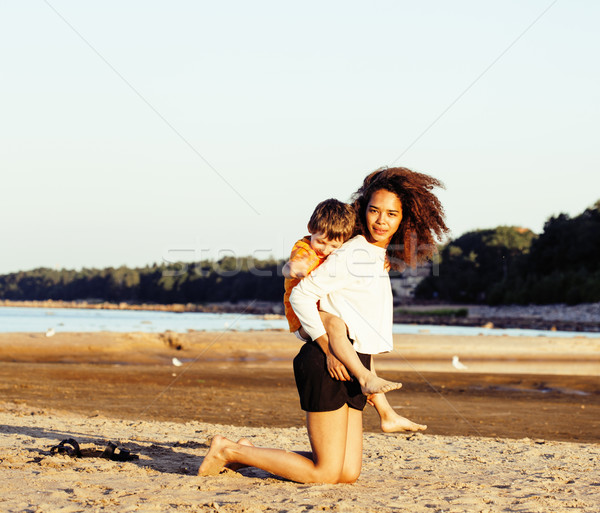 pretty diverse nation and age friends on sea coast having fun, lifestyle people concept on beach vac Stock photo © iordani