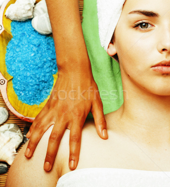 Stock photo: stock photo attractive lady getting spa treatment in salon, close up asian hands on face