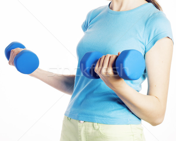 young pretty brunette woman with blue dumbbell isolated cheerful smiling, part of body, diet people  Stock photo © iordani