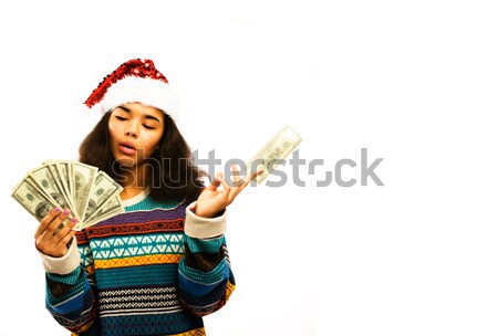 cute young african girl in santas red hat with money isolated Stock photo © iordani