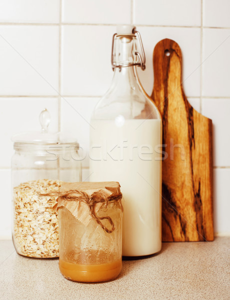 real comfort wooden kitchen with breakfast ingredients close up Stock photo © iordani
