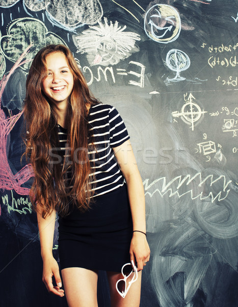 back to school after summer vacations, cute teen girl in classroom Stock photo © iordani