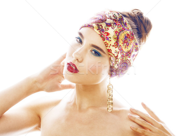 young pretty modern girl with bright shawl on head emotional posing isolated on white background, as Stock photo © iordani