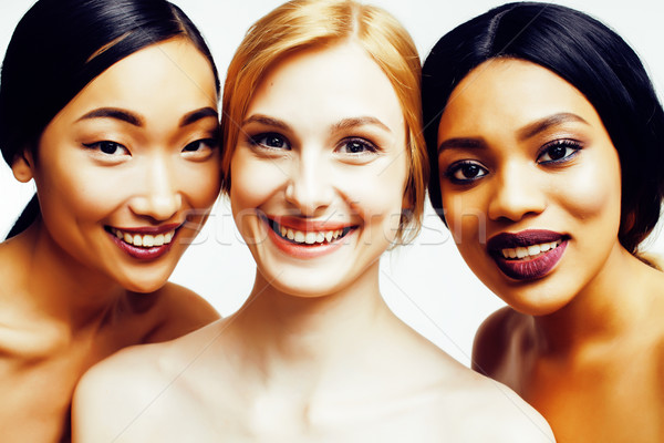 Três diferente nação mulher asiático caucasiano Foto stock © iordani