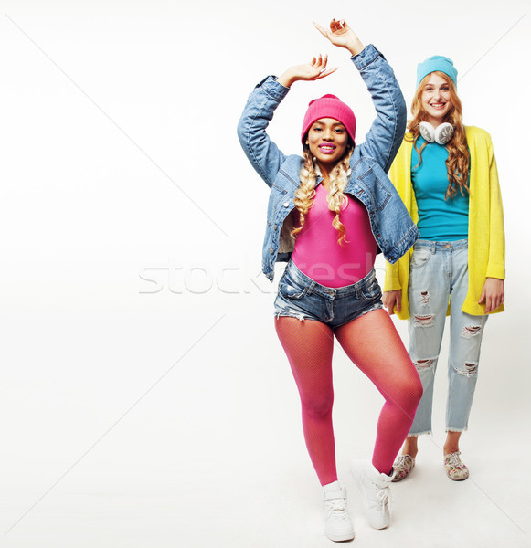 diverse nation girls group, two diverse rase teenage friends company cheerful having fun, happy smil Stock photo © iordani