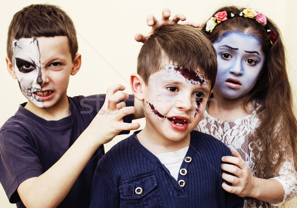 Stock photo: zombie apocalypse kids concept. Birthday party celebration facep