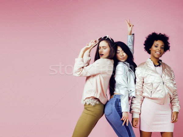 Stock photo: different nation girls with diversuty in skin, hair. Asian, scandinavian, african american cheerful 