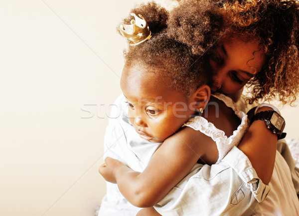 Stock photo: adorable sweet young afro-american mother with cute little daugh