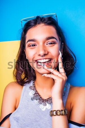 lifestyle people concept. young pretty smiling indian girl with long nails wearing lot of jewelry ri Stock photo © iordani