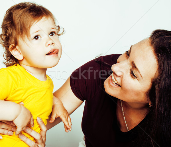 pretty real fashion mother with cute blond little daughter close up isolated on white background, li Stock photo © iordani
