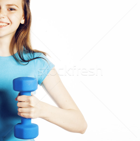 young pretty brunette woman with blue dumbbell isolated cheerful Stock photo © iordani