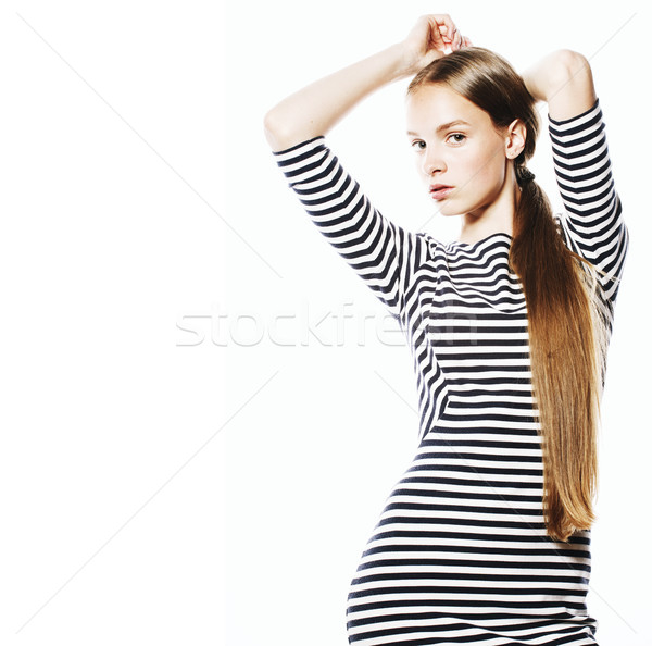 young pretty woman in elegant strip dress isolated on white Stock photo © iordani