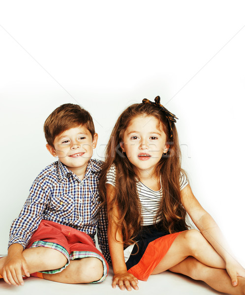 little cute boy and girl hugging playing on white background, ha Stock photo © iordani