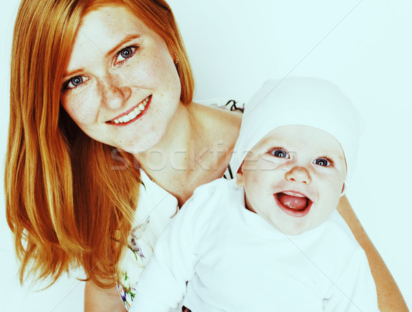 Stock photo: young beauty mother with cute baby, red head happy modern family