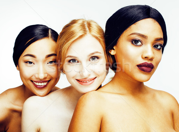Stock photo: three different nation woman: asian, african-american, caucasian together isolated on white backgrou