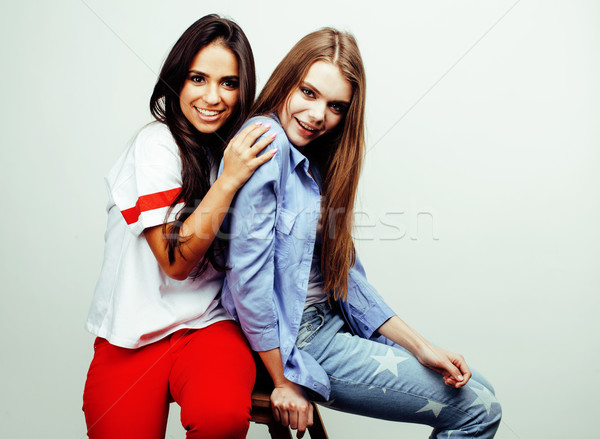 best friends teenage girls together having fun, posing emotional on white background, besties happy  Stock photo © iordani