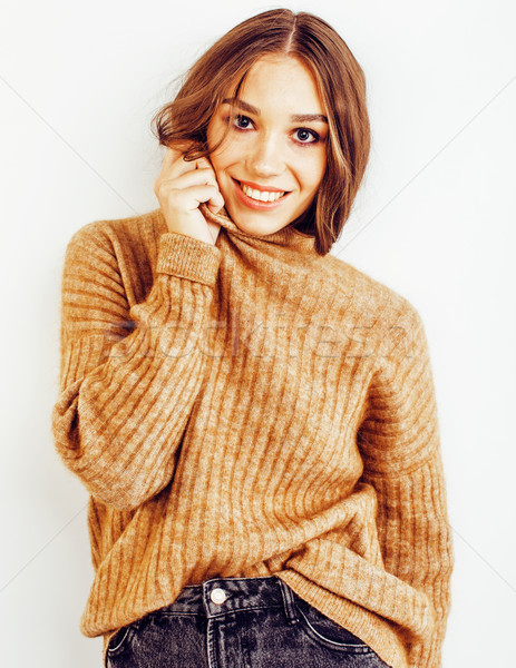 young pretty teenage hipster girl posing emotional happy smiling on white background, lifestyle peop Stock photo © iordani