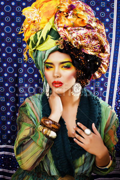 beauty bright woman with creative make up, many shawls on head l Stock photo © iordani