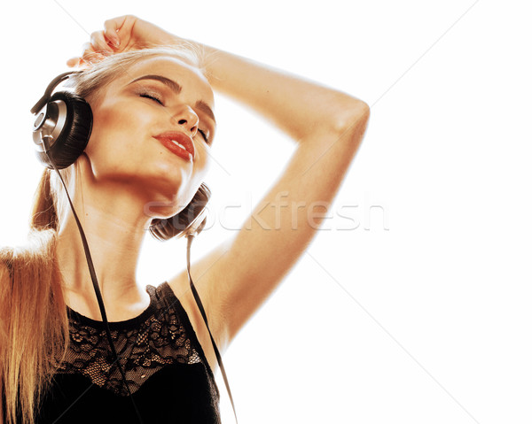 young sweet talented teenage girl in headphones singing isolated Stock photo © iordani